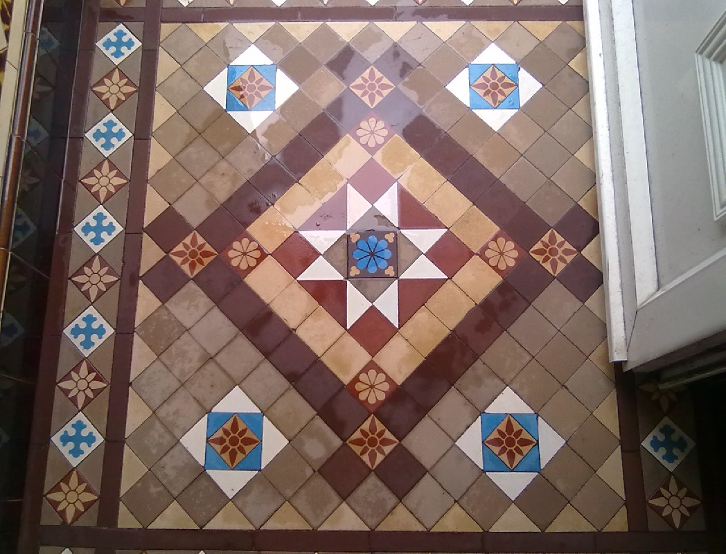 Victorian Tiled Floor Midway through cleaning