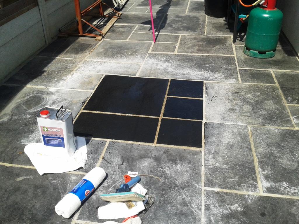 black limestone patio test clean patch in Broadstone